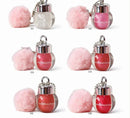 Lip Gloss com Chaveiro Pompom Pompom Ball Pendant Yoyo Maqui Amor - Brilho Intenso e Fofura