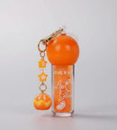 Lip Gloss Laranja com Chaveiro Love Rain - Brilho Espelhado, Hidratação e Aroma Frutal